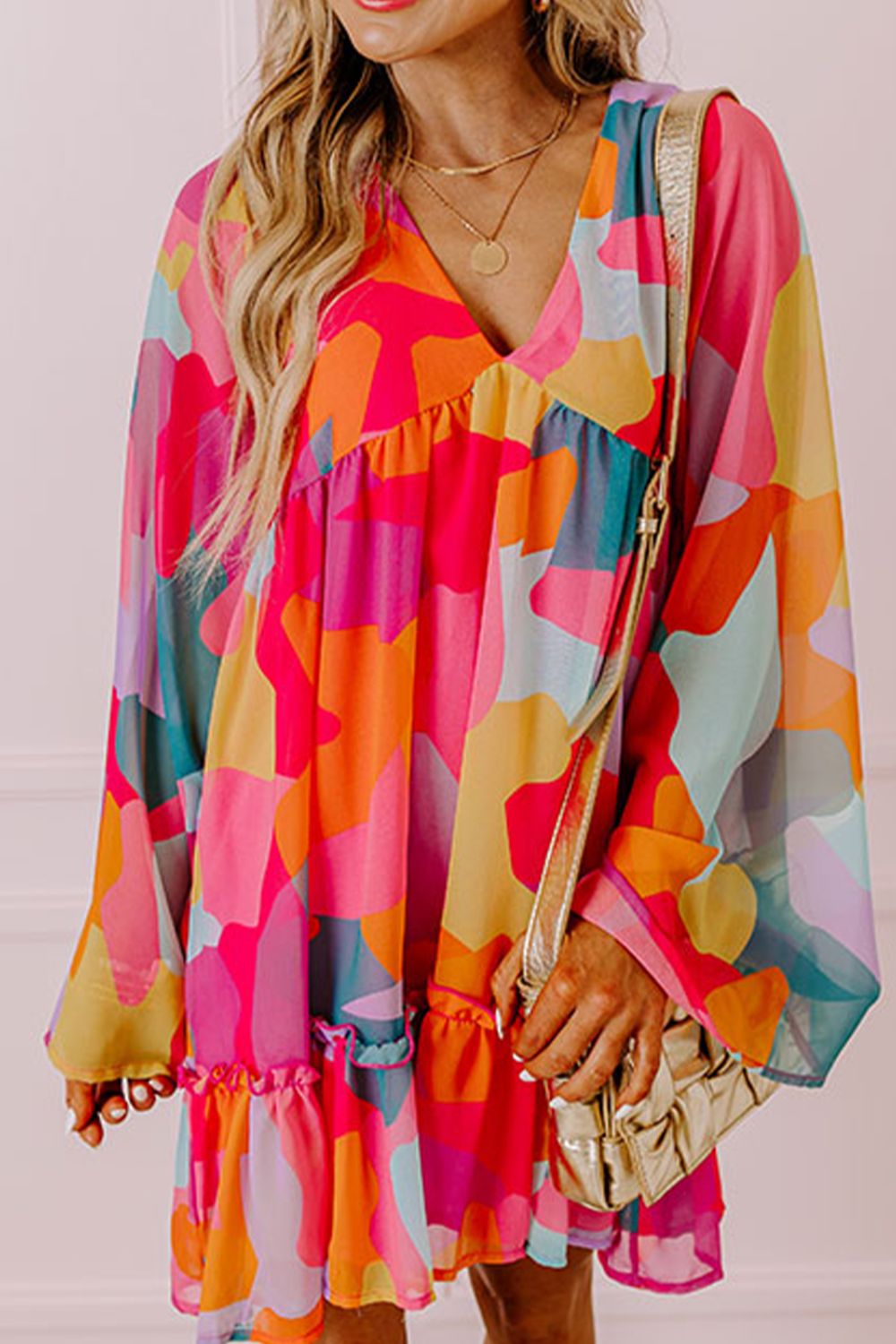Laura Effortless Long Sleeve Mini Dress with Ruffle Hem and Color Block V Neck Statement Occasion Edit